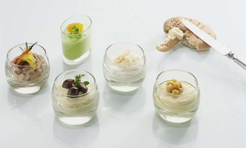 Five starters in glasses with a cookie